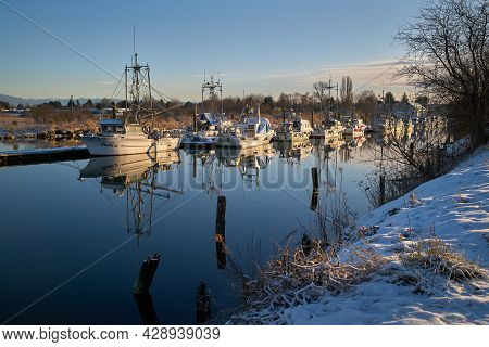 Richmond, British Columbia, Canada - February 22, 2018. Scotch Pond Dock Snow Steveston. Snow Covere