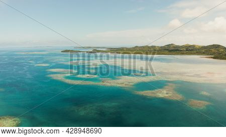 Tropical Islands In Turquoise Lagoon And Coral Reef Water, Aerial View. Bucas Grande, Philippines. S
