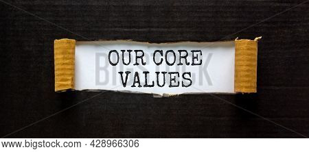 Our Core Values Symbol. Words 'our Core Values' Appearing Behind Torn Black Paper. Beautiful Black B