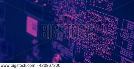 Semiconductor. Cpu Chip Located On The Green Motherboard Of The Computer.