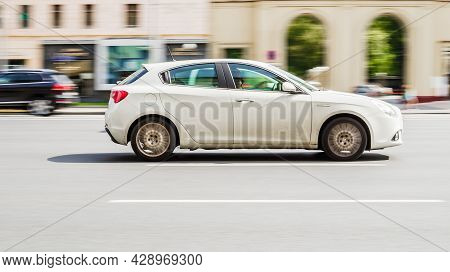 White Premium Class Hatchback Alfa Romeo Giulietta 940 At The City Street, Side View. Moscow, Russia