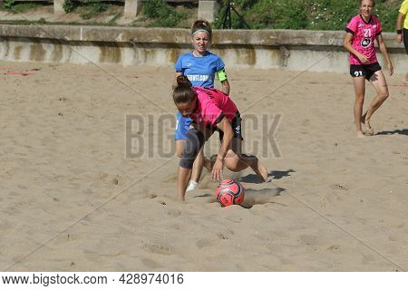 Odessa, Ukraine July 8, 2021: Ukrainian Beach Soccer Women's Cup. The Girl's Footballers Are Despera