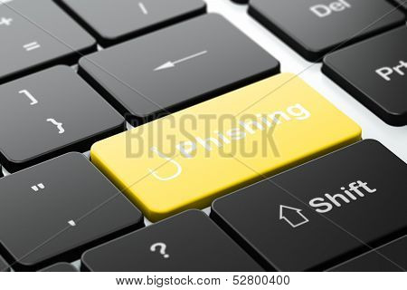 Privacy concept: Fishing Hook and Phishing on computer keyboard