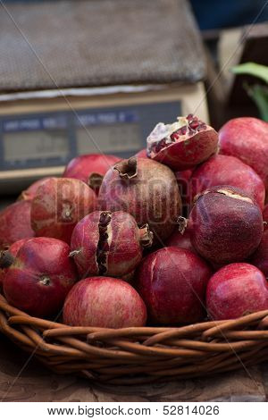Pomegranates in a wicker basket