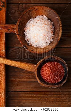 Himalayan Pink Crystal Rock salt and Hawaiian Red Alaea Sea Salt in rustic wooden spoons