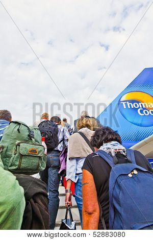 People Board The Flight Home