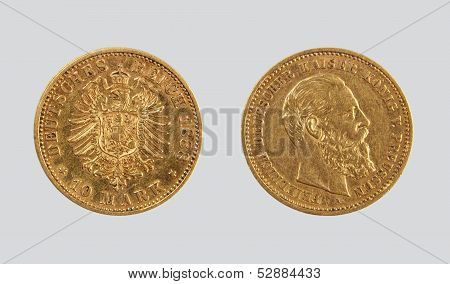10 gold Reichsmarks, Kaiser's Germany, on a gray background
