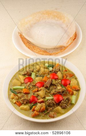 Appam with mutton stew