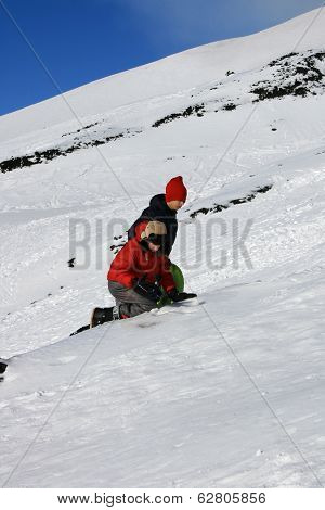 Children Playing In The Snow