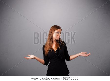 beautiful young lady standing and juggling with copy space