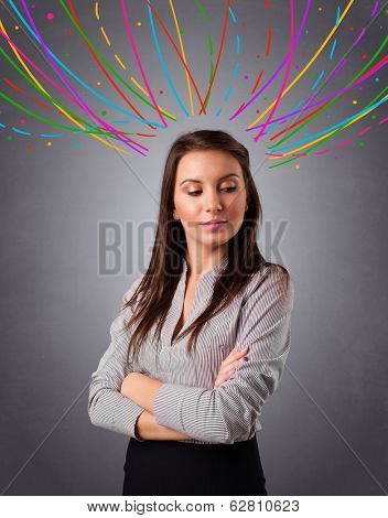 Pretty young girl thinking with colorful abstract lines overhead