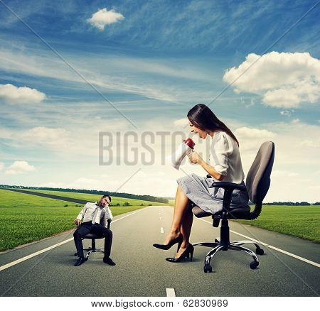 angry young woman and tired young man