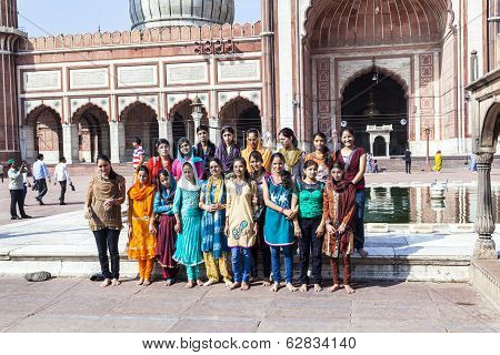 People Pose For A Group Photo At Jama Masjid Mosque, Old Delhi, India.