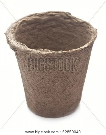 pile peat pots for growing seedlings, isolated on white background 