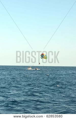 Parachute on blue sea