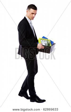 You are fired! Businessman hold box with personal belongings isolated on white background