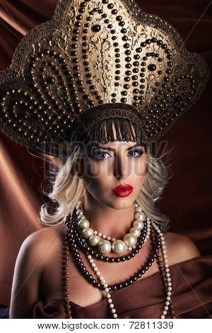 Russian Beauty. Attractive female wearing in kokoshnik.