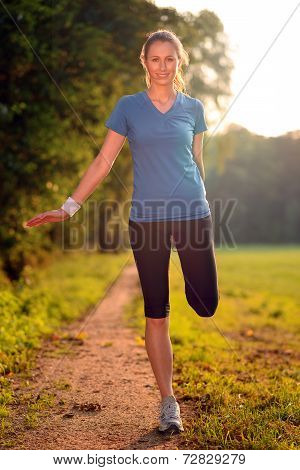 Young Woman Doing Stretching Exercises