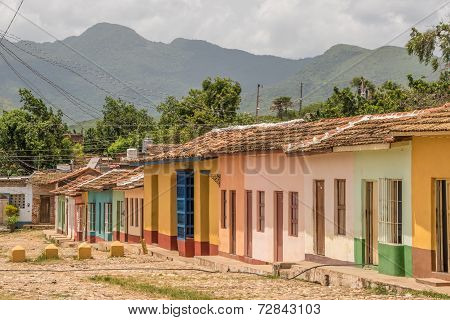 Color full houses along side a street in Trinidad, Cuba