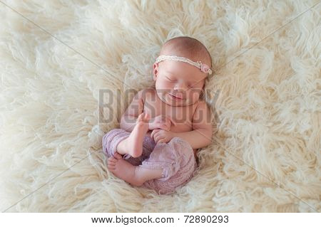 Smiling Newborn Baby Girl