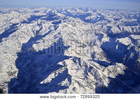 Alpine mountain ridge in winter, aerial view