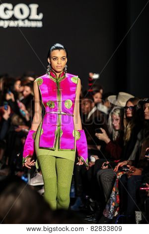 NEW YORK - FEBRUARY 13: A model walks the runway at the Mongol Fall/Winter 2015 collection during Mercedes-Benz Fashion Week in New York on February 13, 2015.