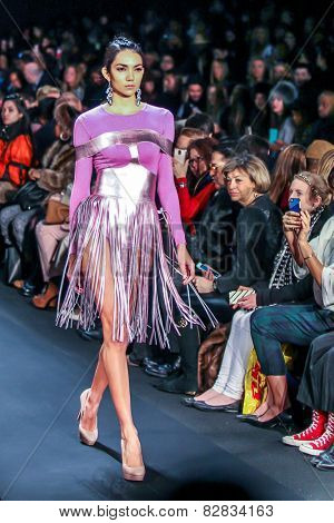 NEW YORK - FEBRUARY 13: A model walks the runway at the Mongol Fall/Winter 2015 collection during Mercedes-Benz Fashion Week in New York on February 13, 2015.