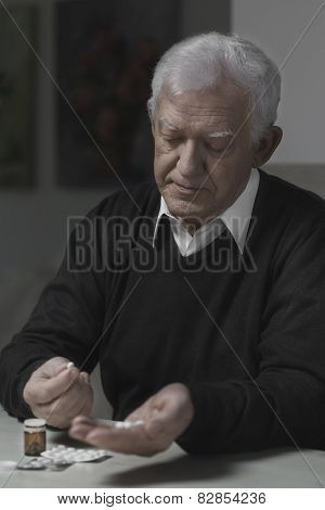 Senior Taking Pills