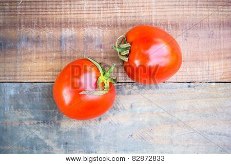tomato on old wooden background