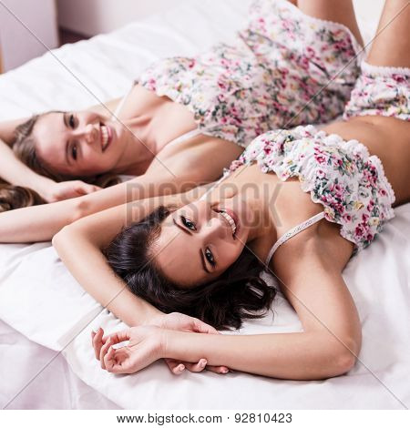 Ttwo beautiful women in the bed