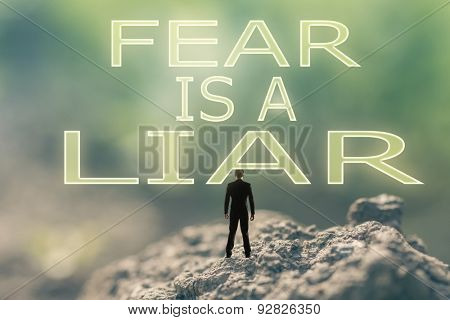 Concept of  with a person stand in the outdoor and looking up the text over the sky in nature background.