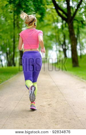 Woman running in a park 