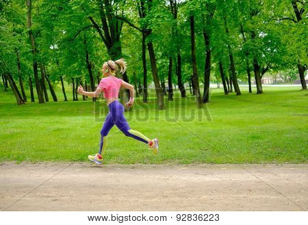 Woman running in a park 