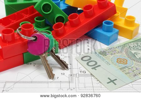 Home Keys, Colorful Building Blocks And Money On Housing Plan