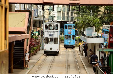 HONG KONG - JUNE 03, 2015: double-decker tram on street of HK. Hong Kong Tramways is a tram system in Hong Kong, being one of the earliest forms of public transport in the metropolis.