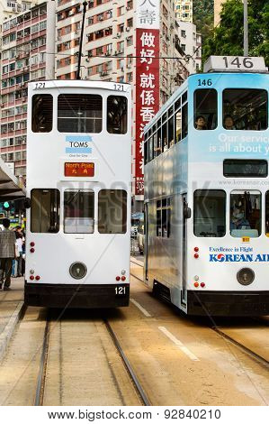 HONG KONG - JUNE 03, 2015: double-decker tram on street of HK. Hong Kong Tramways is a tram system in Hong Kong, being one of the earliest forms of public transport in the metropolis.