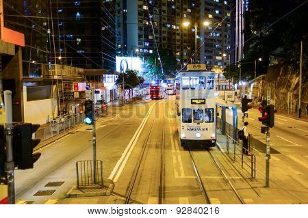 HONG KONG - JUNE 03, 2015: double-decker tram on street of HK. Hong Kong Tramways is a tram system in Hong Kong, being one of the earliest forms of public transport in the metropolis.