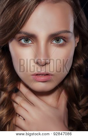 Studio Close Up Portrait Of Young Woman