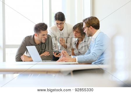 Business people meeting around table