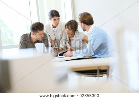 Business people meeting around table