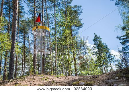 Disc Golf Hole On The Top Of The Hill In The Woods