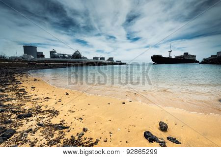 old broken ship agrounded near Lanzarote seashore, Canary Islands, Spain