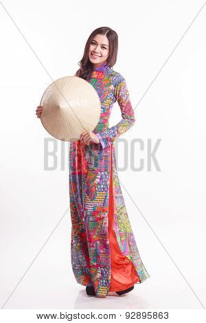Beautiful Vietnamese Woman With Tradition Ao Dai With Modern Design And Palm-leaf Conical Hat ( Non