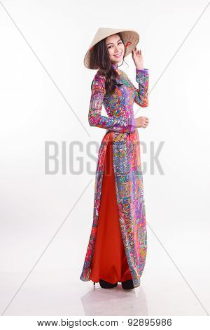 Beautiful Vietnamese Woman With Tradition Ao Dai With Modern Design And Palm-leaf Conical Hat ( Non