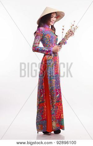Beautiful Vietnamese Woman With Tradition Ao Dai With Modern Design And Palm-leaf Conical Hat ( Non