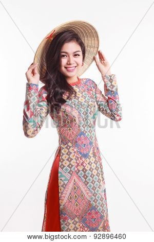 Beautiful Vietnamese Young Woman With Modern Style Ao Dai And Palm-leaf Conical Hat ( Non La ) On Wh