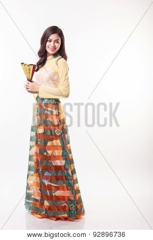 Beautiful Vietnamese Young Woman With Modern Style Ao Dai Holding A Paper Fan On White Background