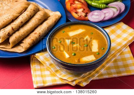 paneer butter masala with chapati / roti / paratha / fulka / indian bread and green salad