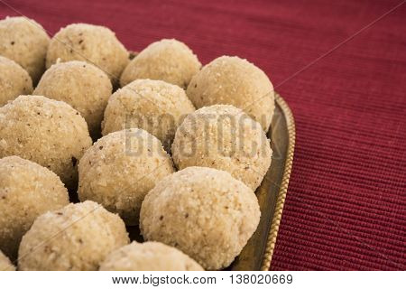 Indian favourite sweet coconut laddu or laddoo or nariyal ladu