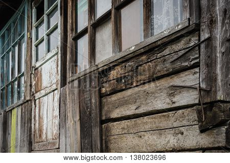 Old Windows and cracked wooden wall rustic home